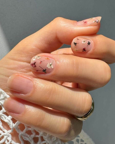 floral nail art by betina goldstein on negative space