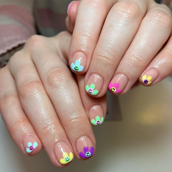 easter nails smiley face floral nail art on negative space